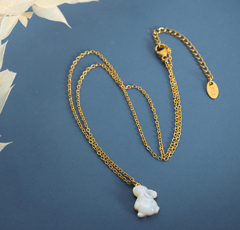 JK inspired 18K gold bunny-shaped gemstone necklace